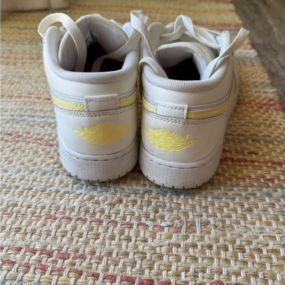 Nike Jordans. Kids White Sneakers with Pale Yellow Accents - Picture 3 of 4